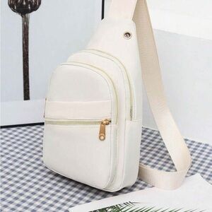 Lulu’s cross body sling backpack bag in white nylon